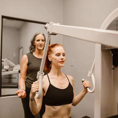 A person's focused expression during a workout session.